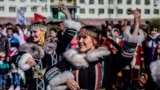 Russia -- Women in indigenous costumes perform during the celebration ahead of the World's Indigenous Peoples Day in Dudinka on August 6, 2016