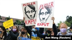 Жители Тайваня на митинге против вторжения России в Украину, 6 марта 2022