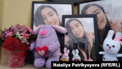 Flowers are left outside the main building of Kyiv's National Medical University in memory of Mukkadas Nasyrlaeva, a student who died on January 30. 