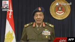 A TV grab shows Field Marshal Hussein Tantawi, who heads the ruling council that took over after President Hosni Mubarak's ouster, announcing the lifting of Egypt's decades-old state of emergency on January 24.