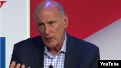The U.S. director of national intelligence, Dan Coats, speaks on July 19 at a security forum in Colorado.