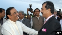 Zardari (left) with Prime Minister Yousaf Raza Gilani after Zardari's election as president