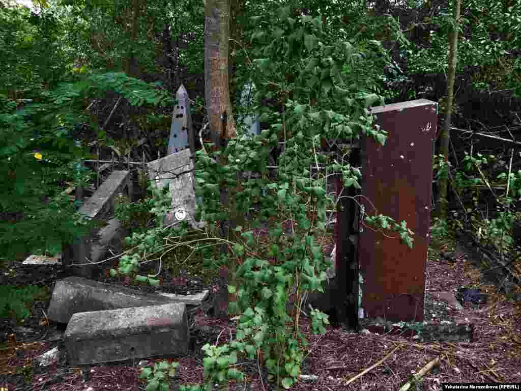 Some of the graves are nearly impossible to reach through the thick undergrowth.&nbsp;