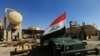 An Iraqi flag is seen on a military vehicle at an oil field in Dibis area on the outskirts of Kirkuk, October 17, 2017