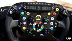 U.K. -- This handout picture received from the Lotus Formula One Team on 28Jan13 shows the steering wheel on the teams newly launched E21 car. 