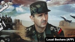 Dəməşqdə Bashar al-Assad-ın portreti