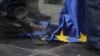 Hungarian protesters trample a burnt EU flag at a rally called by the right-wing party Jobbik in front of the EU headquarters in downtown Budapest in January 2012.