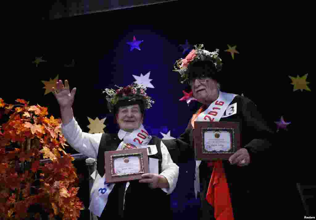Lida Maisuradze (left), 83, and Tristan Kvatashidze, 86, celebrate after winning the "Super Grandmother and Super Grandfather" contest in Tbilisi, Georgia. Twenty-four participants aged 70 and over from all over Georgia competed in the annual contest, organized by charity house Catharsis. (Reuters/David Mdzinarishvili)