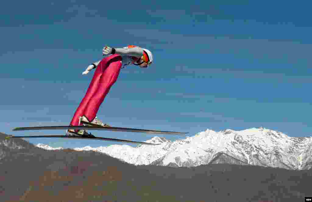 Germany&#39;s Eric Frenzel competes in the ski-jumping portion of the nordic-combined individual event normal hill / 10 km at Russki Gorki Ski Jumping Center.