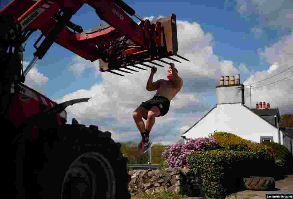 Professional rugby player Alex Craig trains on his parents&#39; farm in Scotland during the coronavirus lockdown. (Reuters/Lee Smith)