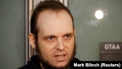 FILE: Joshua Boyle speaks to the media in Toronto in October.