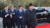 Президент Таджикистана Эмомали Рахмон (справа) с сыном Рустамом Эмомали, главой столичной администрации. Душанбе, 2 декабря 2017 года.
