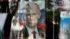 Портрет президента Росії Володимира Путіна у вітрині магазину. Сімферополь, жовтень 2014 року