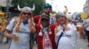Supporters of Liverpool FC and Real Madrid mingle in a special fan zone in Kyiv, which tonight is hosting the final of the Champions League, European soccer's premier competition. 