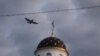 A grab from a YouTube video purporting to show Swede Tomas Mazetti in an airplane over Belarus dropping pro-free speech teddy bears on July 4.