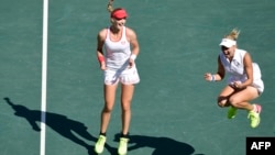 Yekaterina Makarova (left) and Yelena Vesnina of Russia won the women's doubles title at Wimbledon. (file photo)