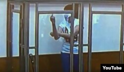 Savchenko makes an insulting gesture toward her Russian judges on March 9.