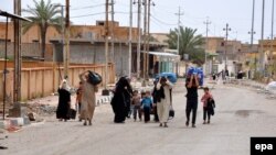 Evakuimi i familjeve në qytetin Heet, Irak, 14 prill 2016