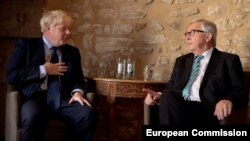 predsjednik Evropske komisije Žan-Klod Junker i britanski premijer Boris Džonson