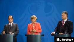 Petro Poroshenko, Angela Merkel və Francois Hollande 