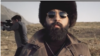 Mehdi Yarrahi, controversial Iranian pop singer who has been banned from performing. Screengrab from music video. 