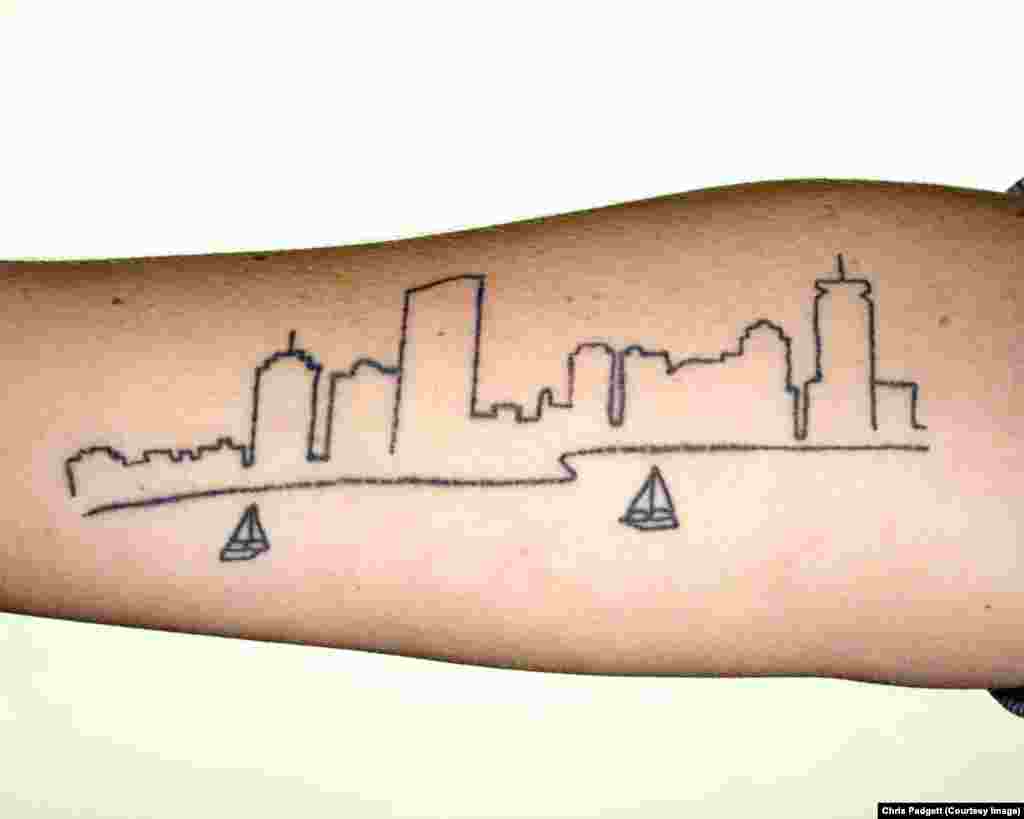 The tattoo on Kate&rsquo;s arm is based on a photograph she took of the Charles River, where she enjoys kayaking.