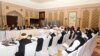 FILE: In Doha, the Taliban, U.S. and Qatari officials attend peace talks about Afghanistan. 