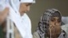 Synthetic Hijabs Get Under Tajik Women's Skin