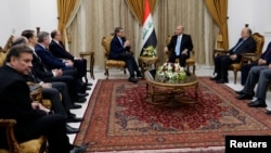 Iraqi President Barham Salih meets with U.S. Energy Secretary Rick Perry at Salam Palace in Baghdad, Iraq December 11, 2018. REUTERS/Thaier al-Sudani