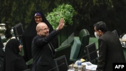 Mohammad Bagher Qalibaf greets members of the parliament after being elected as parliament speaker at the Iranian parliament in Tehran, May 28, 2020