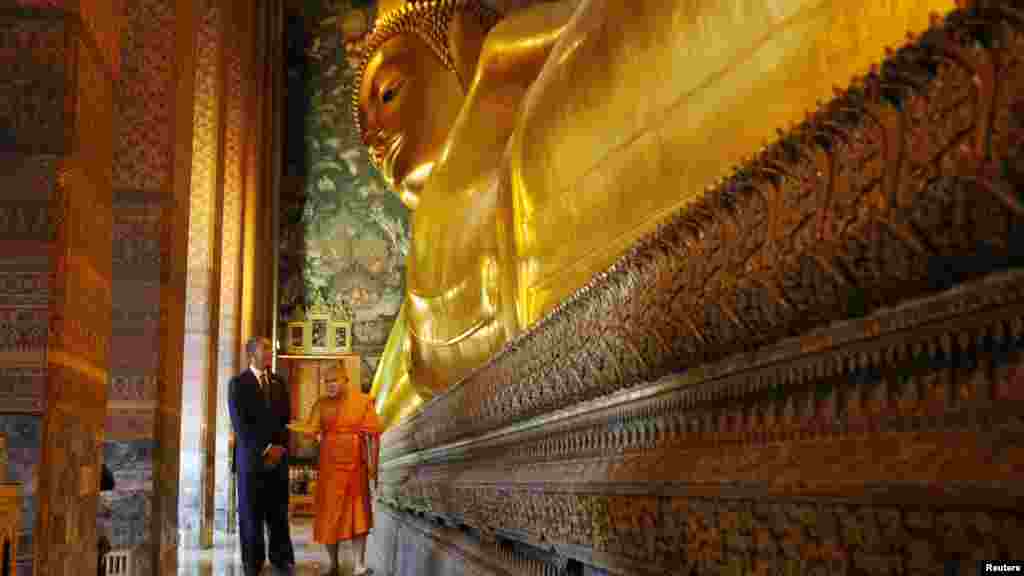 U.S. President Barack Obama tours the reclining Buddha at the Wat Pho Royal Monastery in Bangkok, Thailand. Obama was on a three-country Asia tour, using his first postelection trek overseas to try to show he is serious about shifting the U.S. strategic focus eastward. (Reuters/Jason Reed)
