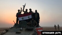 Аксбардории низомиён бо парчами Сурия