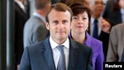 Opinion polls show Emmanuel Macron (pictured) running second to far-right leader Marine Le Pen, but indicate he has a good chance of beating her in a potential May 7 runoff between the two top candidates. 