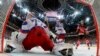 Canada's Ennis Tyler scores against Russia during the ice hockey world championship game in Prague on May 17. 