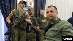 Aleksandr Borodai (right) with other pro-Russian separatists in Donetsk, Ukraine, in 2014.