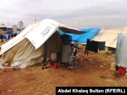Лагерь сирийских беженцев в районе Думиз в Ираке. 23 января 2013 года.
