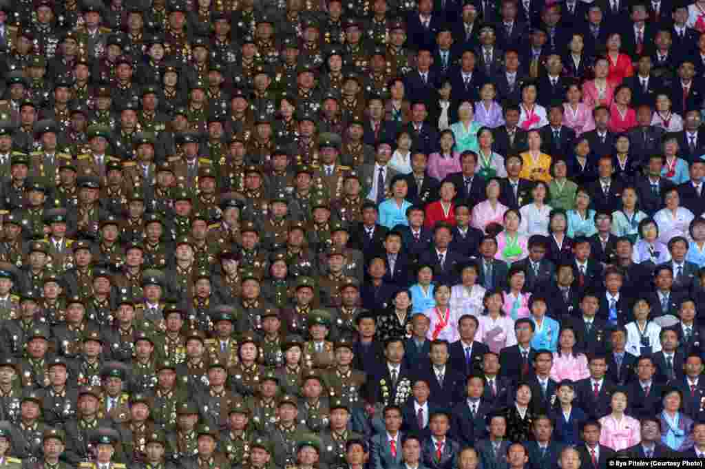 Photographer Ilya Pitalev of Russia was selected in the Current Affairs category for this shot taken during the celebrations of the 100th anniversary of the birth of North Korea founder Kim Il Sung in Pyongyang in April 2012.