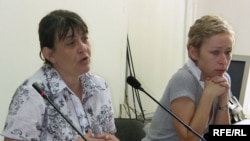 Marika Tsotsoria, left, and Natalia Parfenova, wives of arrested Kazatomprom executives at a press conference on July 1