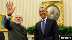 U.S. President Barack Obama (left) hosts a meeting with Indian Prime Minister Narendra Modi in Washington last year. 