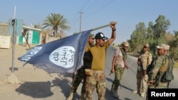 Skidanje zastave 'Islamske države' sa vraćnih teritorija 