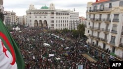 Акция протеста в столице Алжира, 22 марта 2019 года.