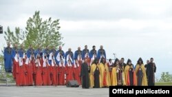 Armenia - Catholicos Garegin II (C) leads a prayer service at the Armenian Genocide Memorial complex in Yerevan, 24 Apr2015.