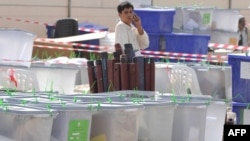 Ballot boxes filled with ballot papers at the Election Commission office in Kandahar.