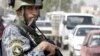 An Iraqi policeman at a checkpoint in central Baghdad (file photo)