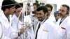 Iranian President Mahmud Ahmadinejad (center) inspects the Natanz enrichment plant in March 2007.