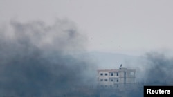 Tym në qytetin Kobani ku po zhvillohen luftime të ashpra