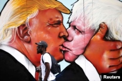 Граффити в Бристоле с изображением Дональда Трампа и Бориса Джонсона