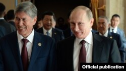 Алмазбек Атамбаев жана Владимир Путин ШКУнун Бишкектеги жыйынында. 2013-жыл, сентябрь. 