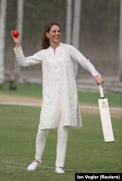 Catherine, the duchess of Cambridge, plays cricket at the National Cricket Academy in Lahore on October 17.