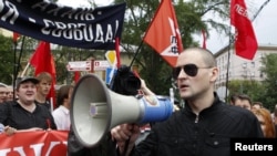 Opposition leader Sergei Udaltsov speaks during an anti-government protest in Moscow on June 12, 2012.